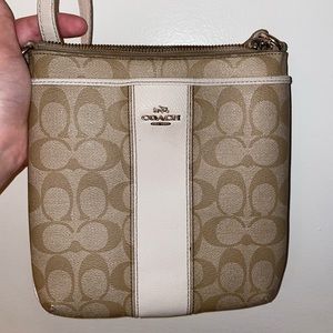 Medium sized Coach crossbody purse.